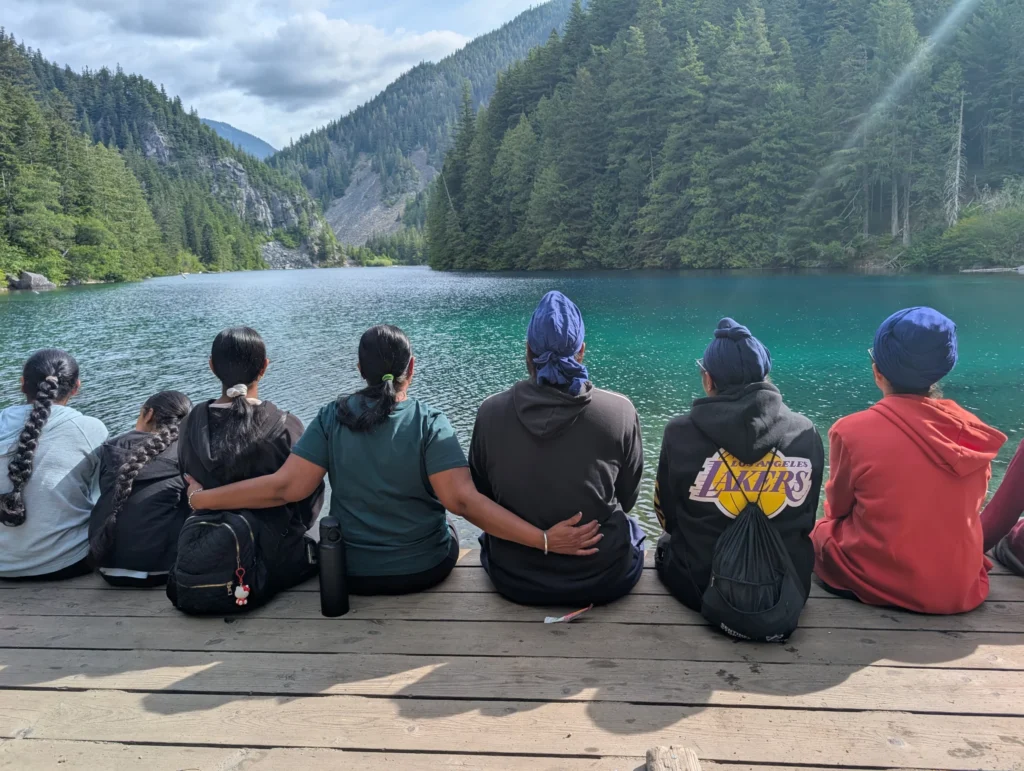 Team gathered at mountain viewpoint