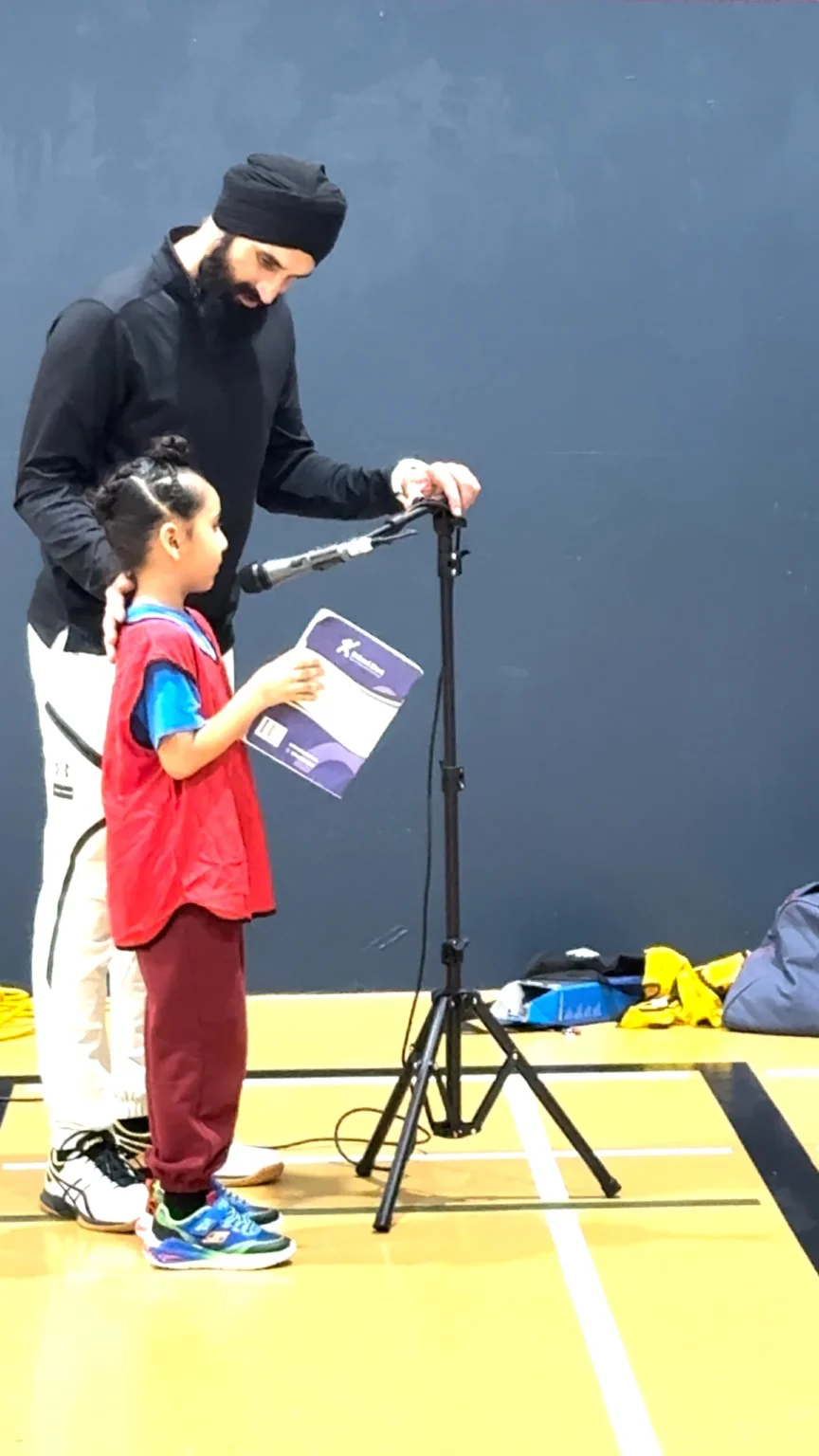 Young member giving speech at podium