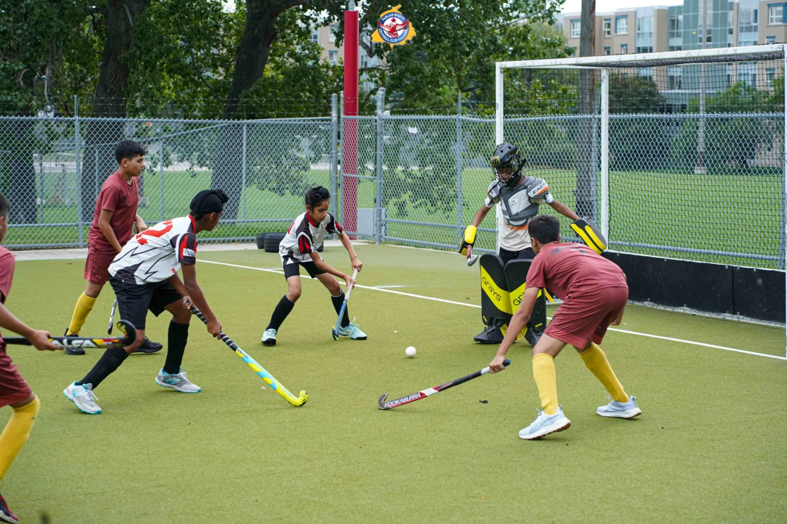 Field hockey tournament battle on turf
